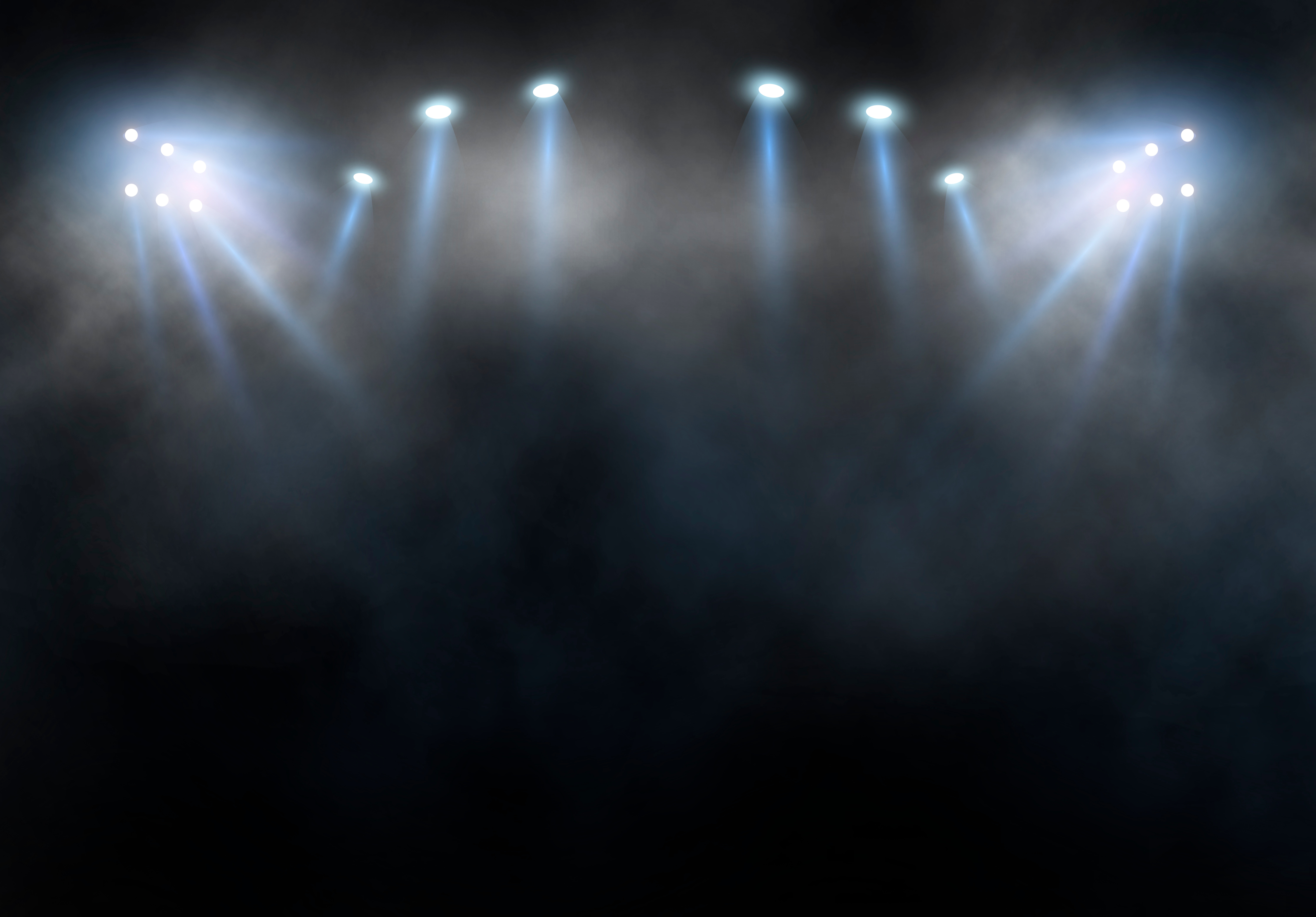 Bright stadium arena lights and smoke at night